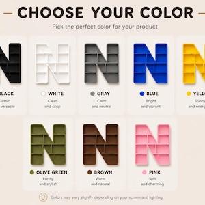 K&ouml;nnte beinhalten: Eine Farbkarte mit dem Buchstaben "N" in verschiedenen Farben: Schwarz, Wei&szlig;, Grau, Blau, Gelb, Olivgr&uuml;n, Braun und Rosa. Jede Farbe ist mit einem beschreibenden Adjektiv versehen. Der Text "W&Auml;HLEN SIE IHRE FARBE" steht oben.