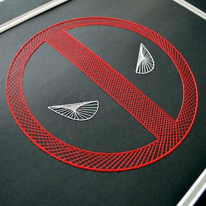 May include: A red embroidered circle with a white line across the middle, creating a "no" symbol. The circle is on a black background.