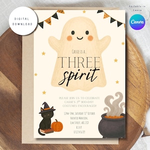 May include: A Halloween-themed invitation card featuring a cream-coloured ghost, a black cat wearing a witch hat, a pumpkin, and a cauldron. The text reads: Cassie is a... THREE spirit. Please join us to celebrate Cassie's 3rd boo-day! Costumes encouraged!