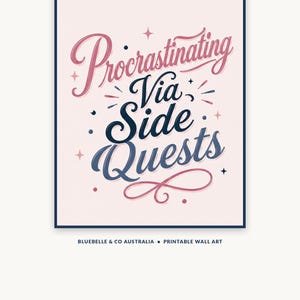 May include: A rectangular wall art print featuring the text Procrastinating Via Side Quests in a mix of pink and dark blue cursive and serif lettering. The design includes small star and dot accents on a light pink background with a dark blue border.