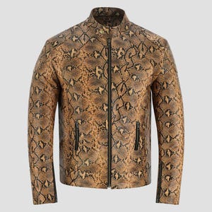 May include: A long-sleeve jacket featuring a brown and black snakeskin pattern. The jacket has a mandarin collar with a single snap button, a full-length central zipper, two zippered side pockets, and zippered cuffs on each sleeve.