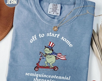 Camiseta divertida con meme de rana del 4 de julio con temática de travesuras del 250 aniversario de Estados Unidos, rana en patinete, camiseta patriota estadounidense con rana adorable