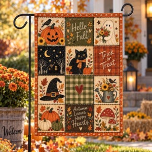 May include: A rectangular garden flag featuring a grid of twelve autumn-themed illustrations including a jack-o'-lantern, a ghost holding flowers, a black cat, a witch hat, a watering can with sunflowers, mushrooms, and text reading Hello Fall, Trick or Treat, and Autumn Leaves Happy Hearts.