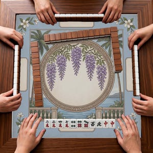 May include: A square mahjong table with a wooden frame featuring a central circular illustration of purple wisteria flowers. The game board displays a tropical landscape with palm trees and a balustrade. Rectangular mahjong tiles are arranged.