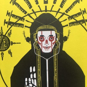 May include: A black and white illustration of a person wearing a black hooded robe with a skull-like face painted in red and white. The person is standing against a yellow background with a crown of swords above their head.