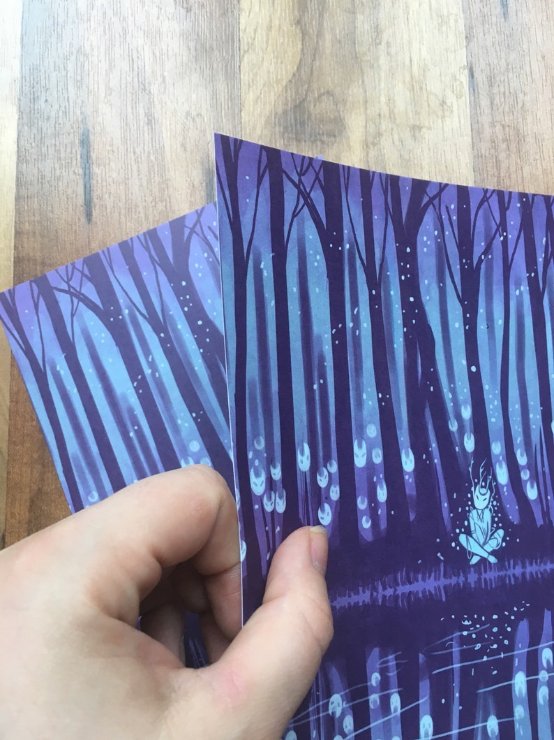 May include: A purple and blue illustration of a forest with a small figure sitting in the center. The figure is surrounded by glowing white orbs and the forest is filled with white dots.