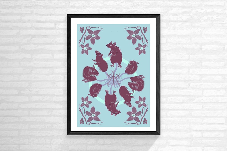 May include: A framed print with a blue background featuring a circle of eight purple rats with floral accents.