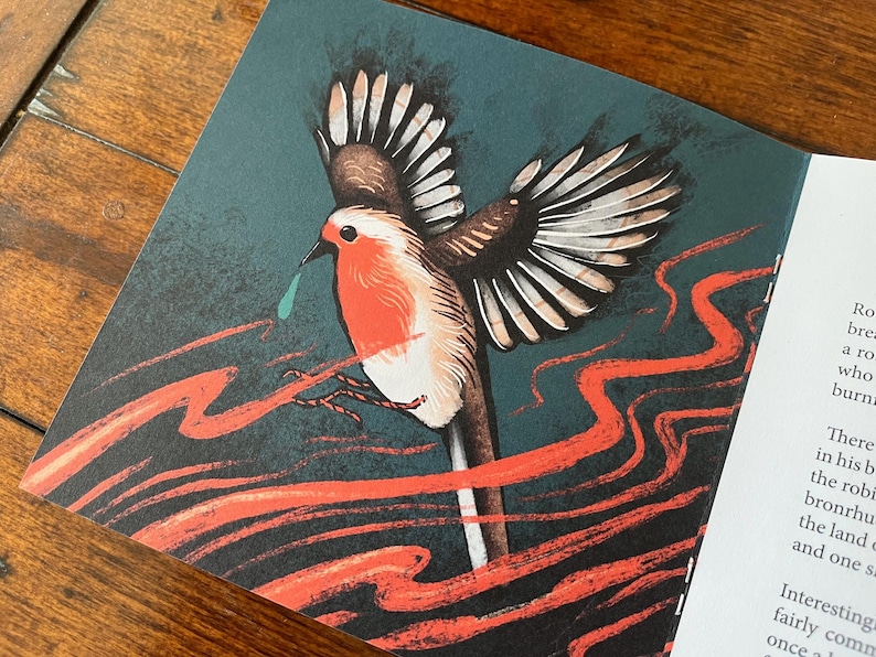 May include: A red robin with a blue teardrop flying against a dark green background with red, wavy lines. The robin has its wings spread wide and is in mid-flight.