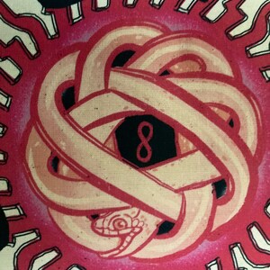 May include: A pink and red sun with black lightning bolts around it. The sun has a white and pink knot in the center with a black hexagon containing the number 8.