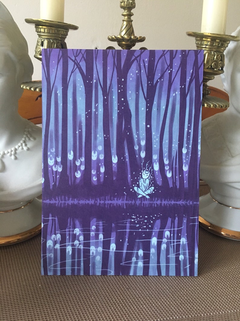 May include: A purple and blue illustration of a forest with a small figure sitting in the middle of a reflecting pool. The figure is surrounded by glowing white orbs.