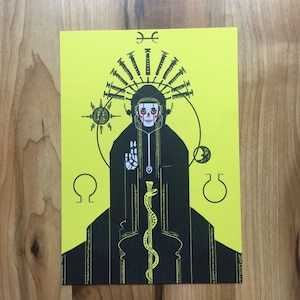 May include: A black and yellow print of a figure wearing a black hooded robe with a skull face and a crown of syringes. The figure is holding a staff with a snake wrapped around it. The background is yellow with black symbols.
