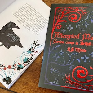 May include: A black book cover with a red and blue design featuring a crow. The title of the book is "Attempted Murder: Carrion Crows in British Folklore" by R.S. Whittle.