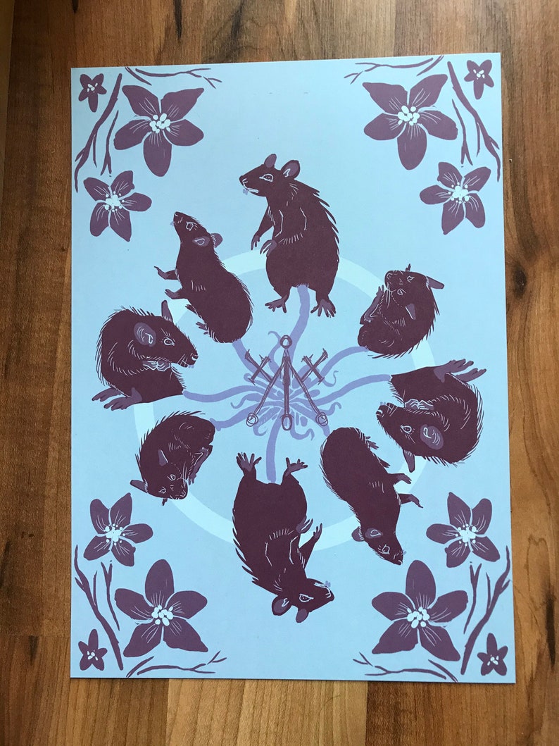 May include: A blue background with a circle of eight black rats in various poses. The rats are arranged around a central symbol of three swords. The background is decorated with purple flowers.