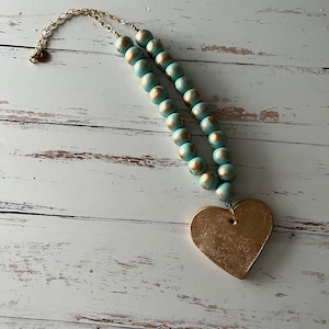hand painted wood necklace hand painted clay heart metallic gold necklace long layering jewelry mint necklace gold necklace image 1