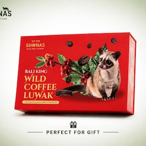 May include: A rectangular red box featuring the text SHWNAS COFFEE ARTISAN, BALI KING WILD COFFEE LUWAK, and The Most Exquisite Coffee in The World. The box displays a graphic of a civet, green coffee leaves, red coffee cherries, and beans.