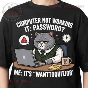 May include: A black t-shirt featuring a graphic of a gray cat in a green sweater vest sitting at a desk with a laptop. The text reads: COMPUTER NOT WORKING IT: PASSWORD? ME: IT'S "WANTTOQUITJOB". A mug says HANG IN THERE and a note says DON'T QUIT (YET).