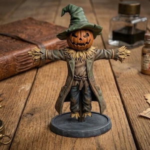 May include: A detailed figurine of a scarecrow with a carved pumpkin head, wearing a green hat and coat. The scarecrow has straw arms and a straw collar, standing on a gray circular base. The figurine is set on a wooden surface.