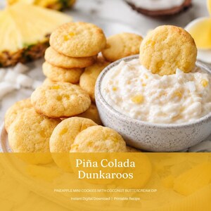 May include: A close-up shot of a plate of mini cookies and a bowl of dip. The cookies are round, golden-yellow, and have small pieces of pineapple. The dip is white with visible coconut flakes and pineapple chunks. The text "Piña Colada Dunkaroos" is visible.