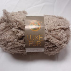 Discontinued Lion Brand Luxe Fur -Super Bulky Yarn in color 123 Tan