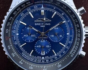 Orologio da uomo vintage Breitling 1884 Navi Timer Chrono al quarzo con quadrante blu, cassa in acciaio inossidabile, lunetta girevole, secondi e data.