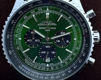 Orologio da uomo vintage Breitling 1884 Navitimer Chrono al quarzo con quadrante verde, cinturino in pelle nera, cassa argentata, lunetta girevole e datario/secondi.