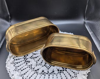 Vintage set van 2 massief messing plantenbakken met handgrepen