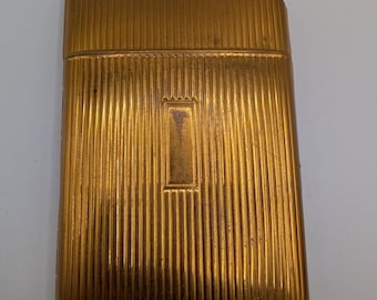 Vintage goudkleurige metalen sigarettenkoker met aansteker van EVANS