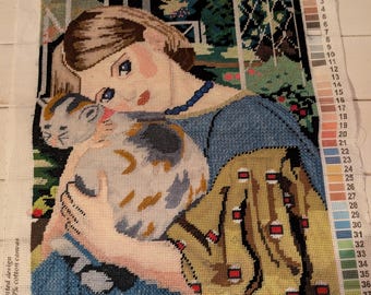 Vintage handgemaakt borduurmotief "Een meisje met een kat, afgewerkt stuk. 15 x 18"