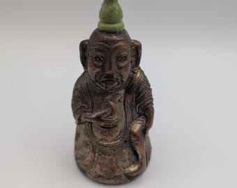 Vintage Chinese figurale bel, man met kruisbloemknop