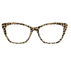 May include: A pair of eyeglasses with a cat-eye frame. The frame features a leopard print pattern in shades of tan and black. The lenses are clear, and the glasses are set against a white background. The overall style is fashionable and bold.