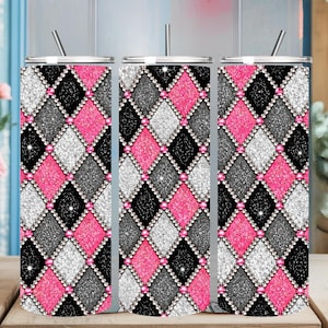 May include: A cylindrical tumbler with a straw featuring a repeating diamond pattern in glittery pink, black, and silver. The diamonds are outlined with small, round, silver-toned beads at each intersection, creating a textured, sparkling appearance.