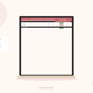 May include: A laptop displaying a stock and sales tracker spreadsheet. The top of the screen has a maroon header with the text "STOCK & SALES TRACKER - FASHION BRAND 101". A small card on the left reads "Stock & Sales Tracker" with additional text.
