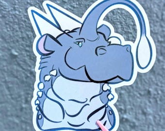 May include: A die-cut sticker featuring a cartoon blue dragon-like creature with a light blue underbelly, two pointed horns, and a long, curved antenna extending from its forehead, all outlined in a thick white border.