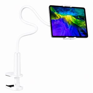 May include: A white flexible gooseneck tablet stand with a sturdy base clamp. The adjustable arm holds a tablet displaying a colorful abstract screen with the time 9:41 visible. The mount features white plastic grips to secure the device in place.