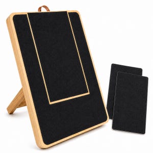May include: A rectangular wooden display board with a black felt surface and a brown leather handle at the top. The board features an integrated kickstand for upright positioning and is accompanied by two smaller, matching black felt rectangular panels.