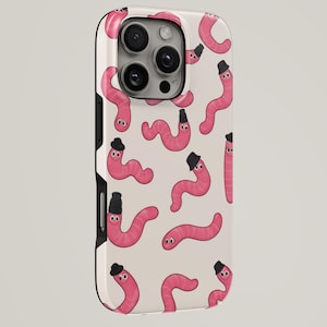 May include: A smartphone case featuring a repeating pattern of pink worms on a light beige background. Several of the worms are wearing small black hats. The case has a cutout for a triple-lens camera system on the upper left side.