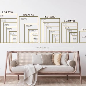 May include: A wall art size guide with various rectangular frames in different ratios, including 2:3, ISO A1-A5, 4:5, 3:4, and 11x14 inches. A sofa, 72 inches or 183 cm wide, is positioned below the guide, with pillows and a blanket.