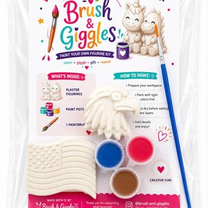 May include: A clear plastic bag containing a "Brush & Giggles" paint-your-own figurine kit. The kit includes plaster figurines, paint pots, and a paintbrush. The packaging features the text "Brush & Giggles" in colorful lettering, along with instructions and social media information.