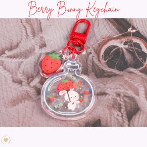 Berry Bunny in a Bottle Holographic Keychain, Rabbit Purse or Backpack Charm, Double Sided Cute Bunny Acrylic Keychain with Strawberry Charm
