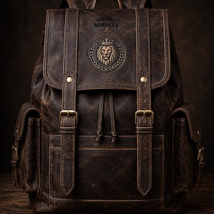 May include: A brown leather backpack with a flap closure, side pockets, and adjustable straps. The backpack features a lion crest and the text "NORVEXX" on the front. The bag has brass-colored buckles and a drawstring closure.