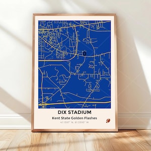 May include: Framed print featuring a blue and gold map of Dix Stadium, home of the Kent State Golden Flashes. The print includes the stadium's name, team name, and coordinates. A football graphic is in the lower right corner.