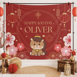 May include: A red fabric backdrop featuring a central circle with the text HAPPY 100 DAY OLIVER, a cartoon horse illustration, gold lanterns, and pink plum blossoms. The banner is available in sizes 80 inches by 68 inches or 104 inches by 88 inches.