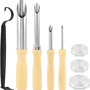May include: A set of four stainless steel coring tools with light-colored wooden handles, a black metal hook tool, and three circular stainless steel discs. The coring tools feature varying diameters of hollow metal tubes for removing centers.