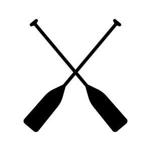 May include: A black silhouette graphic of two crossed boat oars or paddles. The design features long, thin handles with T-shaped grips at the top and wide, flat blades at the bottom, arranged in an X-shape against a plain white background.