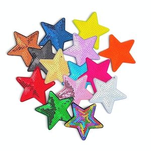 May include: A collection of star-shaped patches covered in sequins in various colours including red, orange, yellow, green, blue, purple, pink, white, and a multi-coloured pattern. Each star features a dense arrangement of small, reflective sequins.