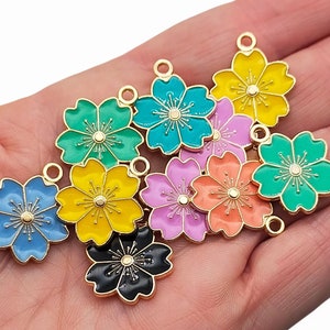 Sets of 10 beautiful flower charms, available in many colours