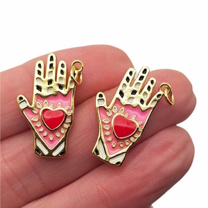 Beautiful milagros hand charms
