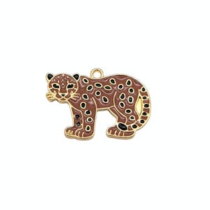 May include: A gold-toned metal charm shaped like a leopard, featuring brown enamel fill and black enamel spots. The leopard is depicted in a standing profile position with a small circular loop at the top for attachment to jewellery or accessories.