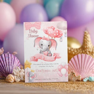 Puede incluir: Una tarjeta de invitación rectangular para baby shower con un elefante gris con un lazo rosa, globos rosas en forma de corazón y una pancarta con el nombre Elena. El texto incluye detalles del evento, fecha, hora y ubicación.