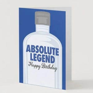 May include: A folded greeting card with a blue background and a white bottle illustration. The text "ABSOLUTE LEGEND" is in blue, and "Happy Birthday" is in a script font.